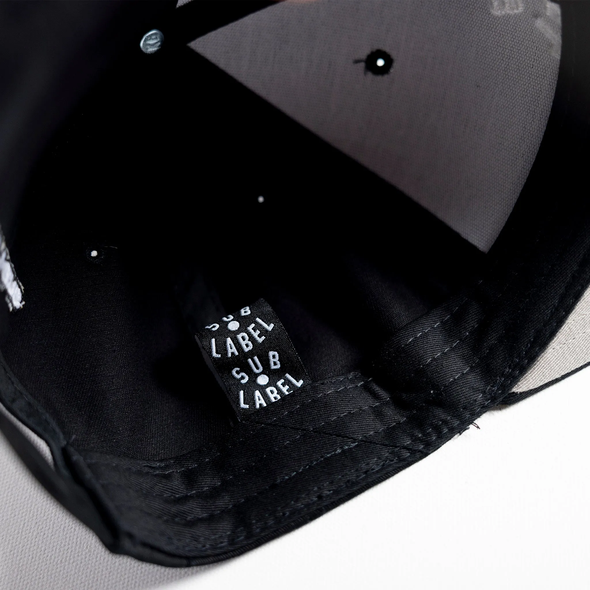 pupil (white) • flatbill snapback hat