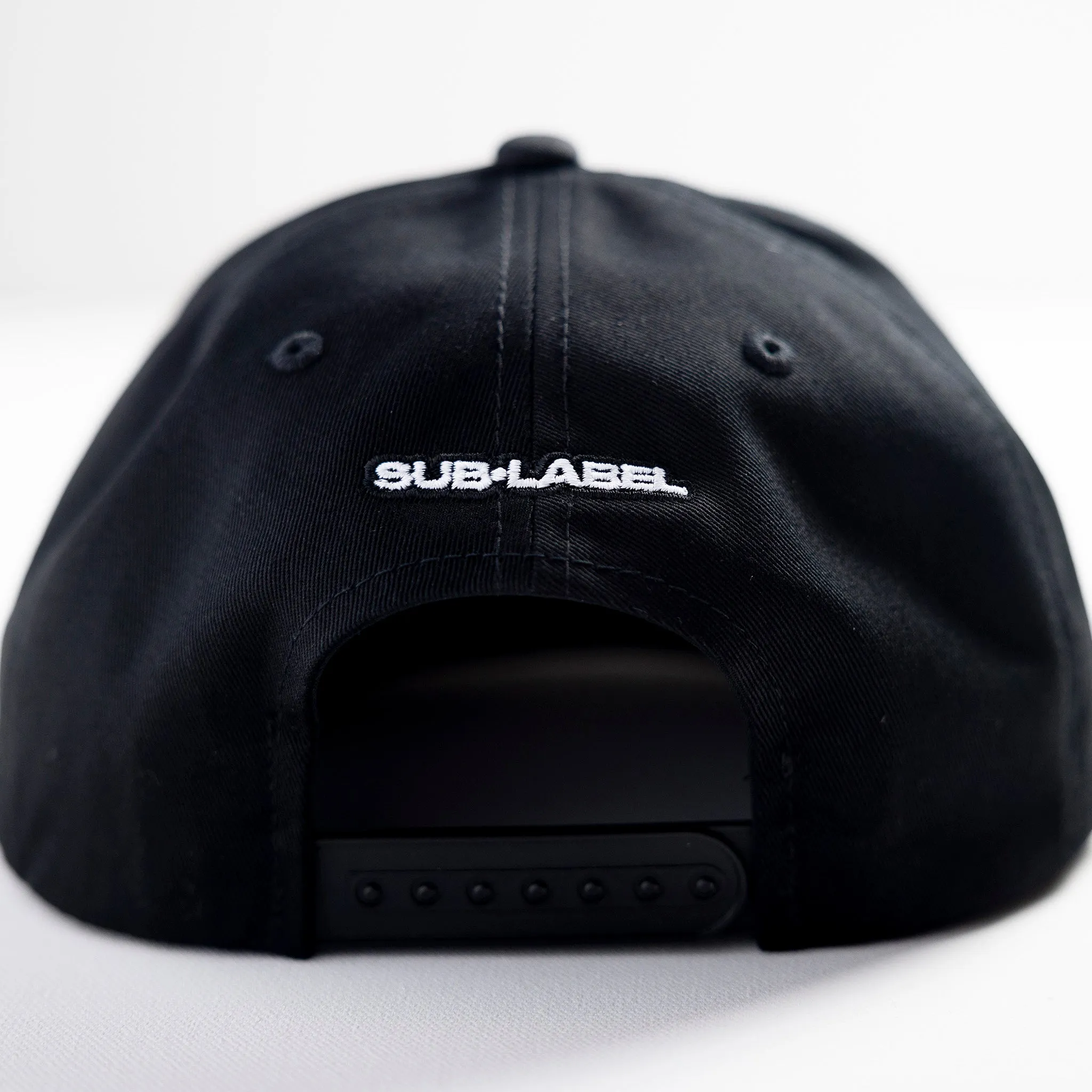 pupil (white) • flatbill snapback hat