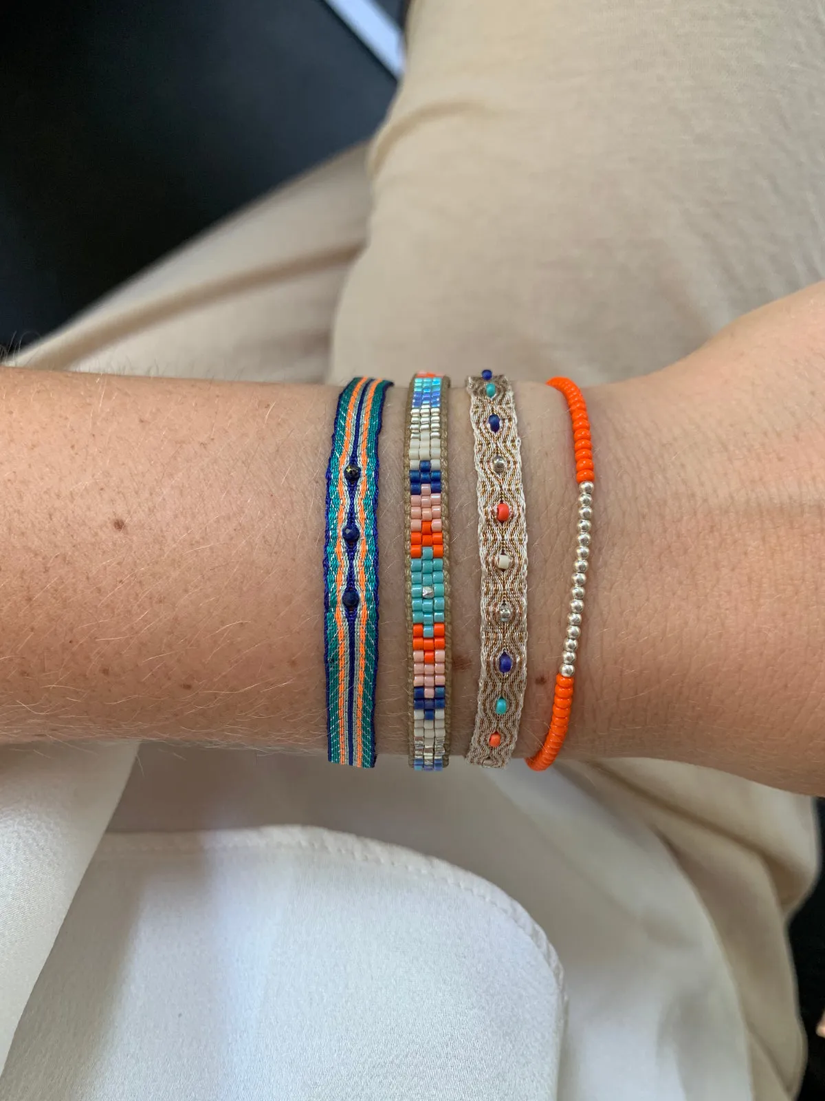 SET OF THREE BRACELETS WITH ORANGE AND BLUE TONES